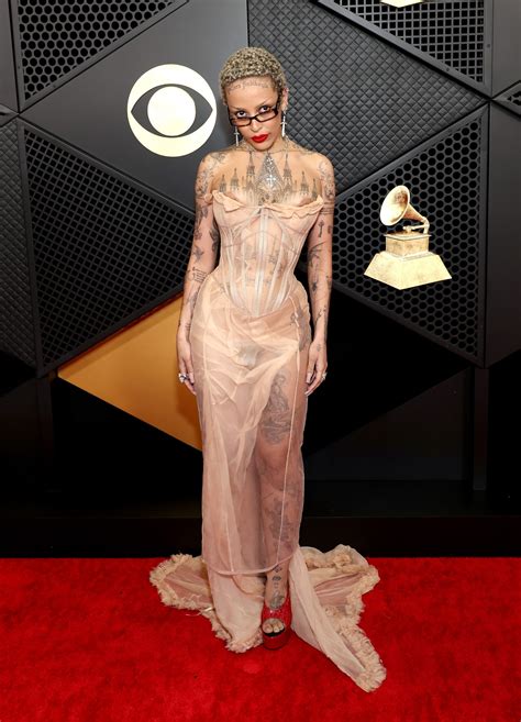 doja cat nipple out at grammys|Doja Cat flaunts fully tattooed body in dress made to look like a ...